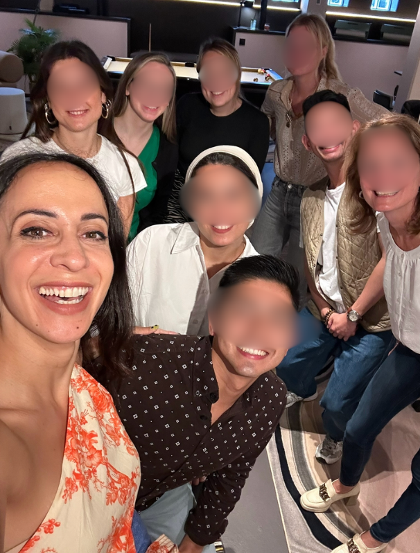 Iné with a team after a workshop